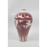 A Chinese red and white porcelain meiping vase decorated with Asiatic flora, 9" high