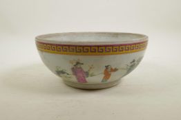 A Chinese famille rose enamel porcelain bowl decorated with brightly robed figures in a landscape,