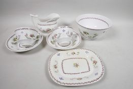C19th floral painted creamware, two cups and saucers, rectangular plate, slop bowl and cream jug (