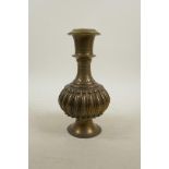 An Indian brass hookah base, the body of ribbed form, 8½" high