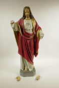 A plaster Sacred Heart figure of Christ, A/F, 25½" high