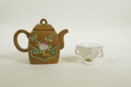 A Chinese Yixing teapot with enamelled peach decoration, impressed seal mark to base, together