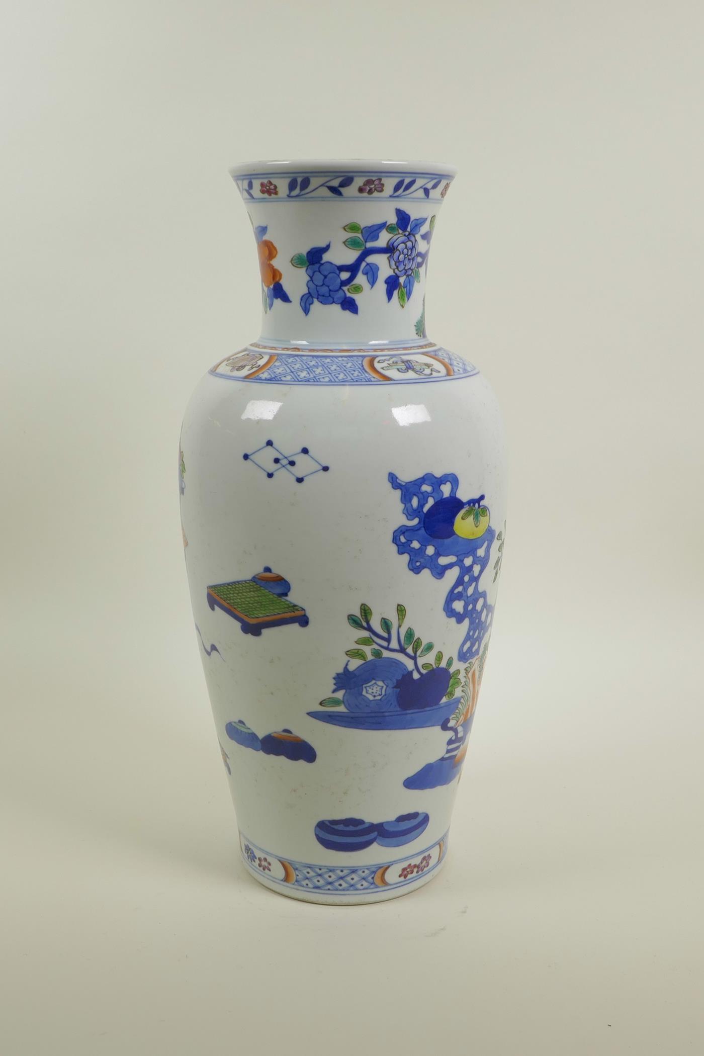 A Chinese polychrome porcelain vase decorated with objects of virtu, auspicious flowers and fruit, 6 - Image 3 of 4