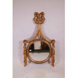 A giltwood wall mirror, with bevelled glass and swag decoration, 47" x 27"