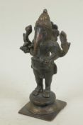 An Indian bronze figurine of Ganesh, 6" high