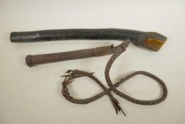 An ethnic wood club, 19" long, and a leather bound whip