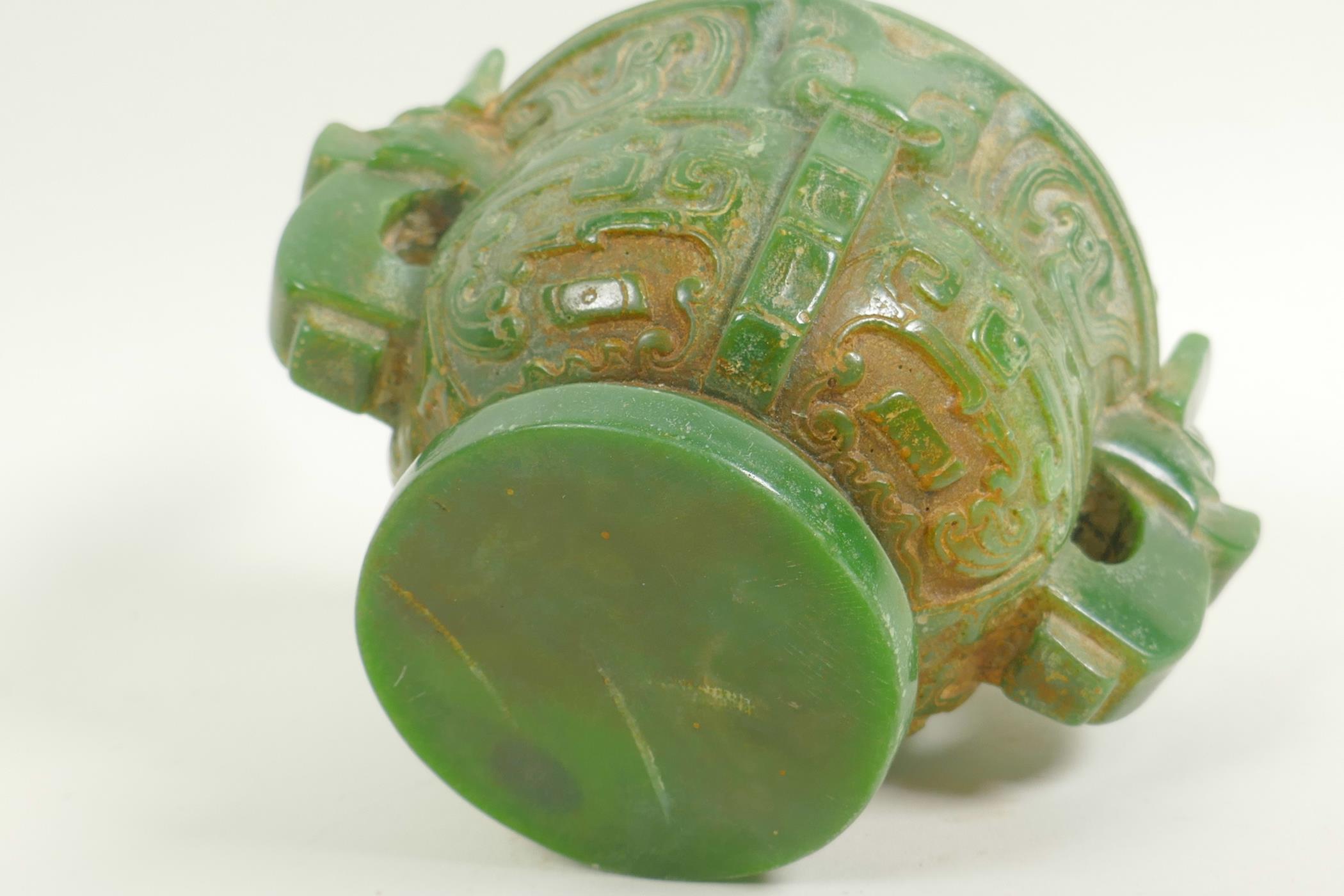A Chinese carved green hardstone censer with two mask handles on pedestal base carved with birds and - Image 5 of 5