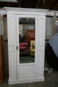 A Victorian painted pine wardrobe, with single mirrored door, 46" x 22" x 82"