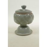 A Chinese celadon glazed pottery censer and cover in the form of a lotus flower, 5½" high