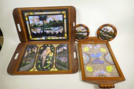 Three Brazilian butterfly membrane trays in inlaid hardwood frames, two featuring views of Rio de