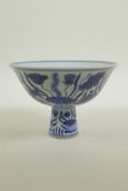 A Chinese Ming style blue and white porcelain stem cup decorated with carp in a lotus pond, 6