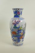 A Chinese polychrome porcelain vase decorated with objects of virtu, auspicious flowers and fruit, 6