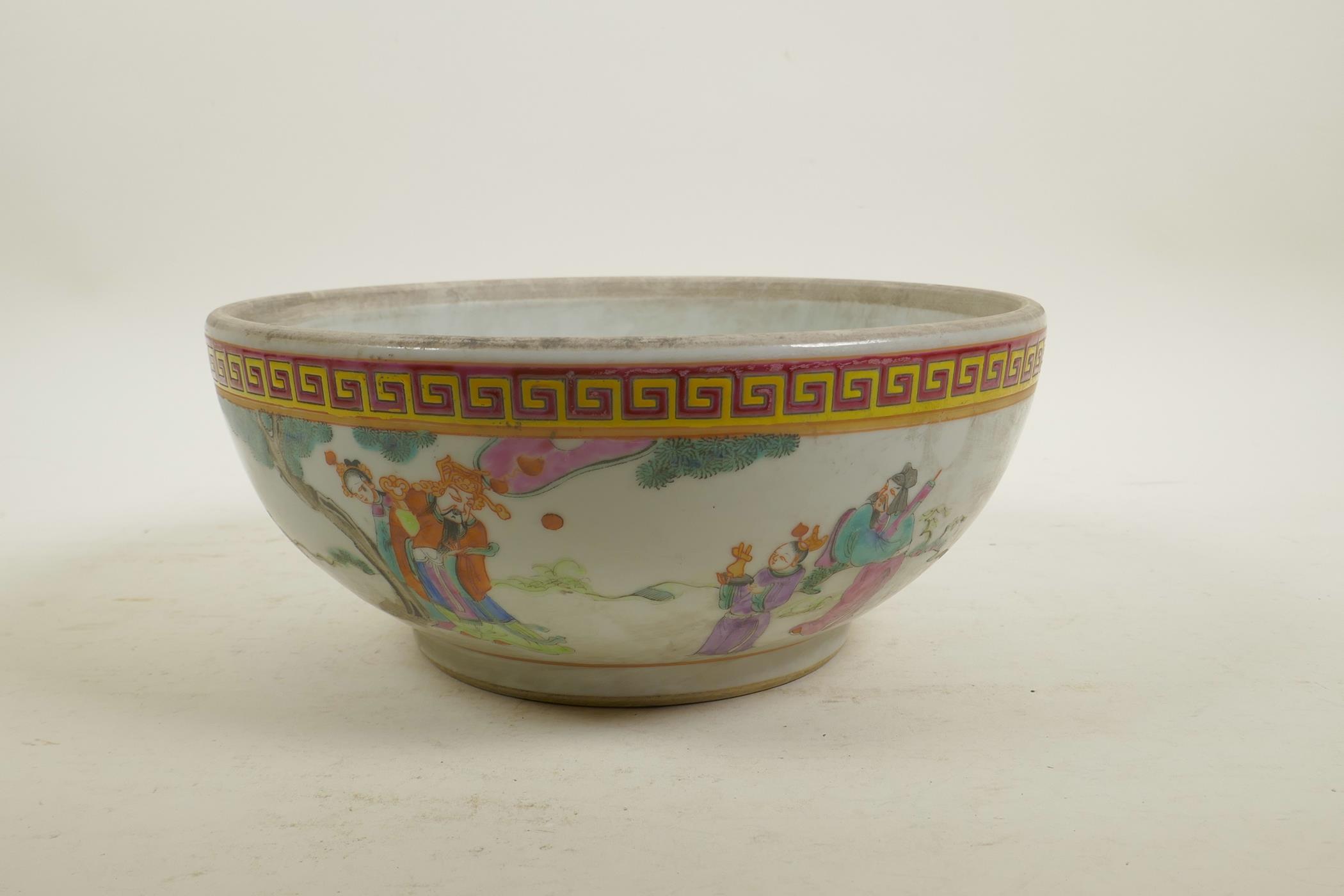 A Chinese famille rose enamel porcelain bowl decorated with brightly robed figures in a landscape, - Image 4 of 5