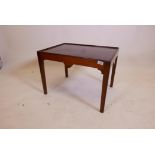 A C19th mahogany dish top occasional table, with a shaped frieze and square tapering legs, 18½" x