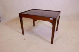 A C19th mahogany dish top occasional table, with a shaped frieze and square tapering legs, 18½" x