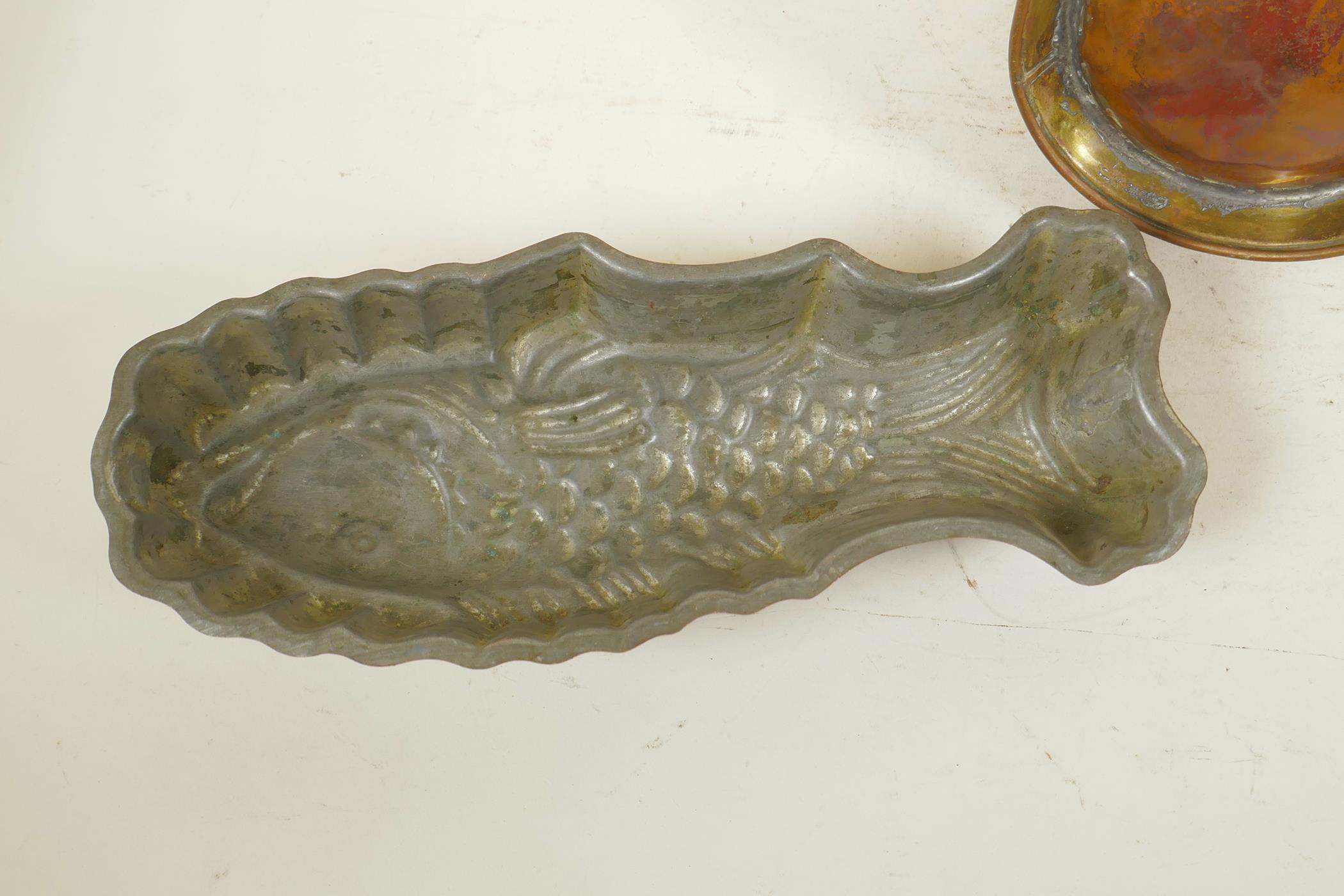 An Arts and Crafts copper jug, together with a coppered metal jelly mould in the form of a fish, - Image 6 of 6