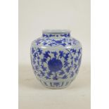 A Chinese blue and white porcelain vase with scrolling floral decoration, 6½" high