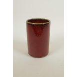 A Chinese flambe glazed pottery brush pot, 5½" high