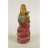 An amber style Quan Yin, 5½" high