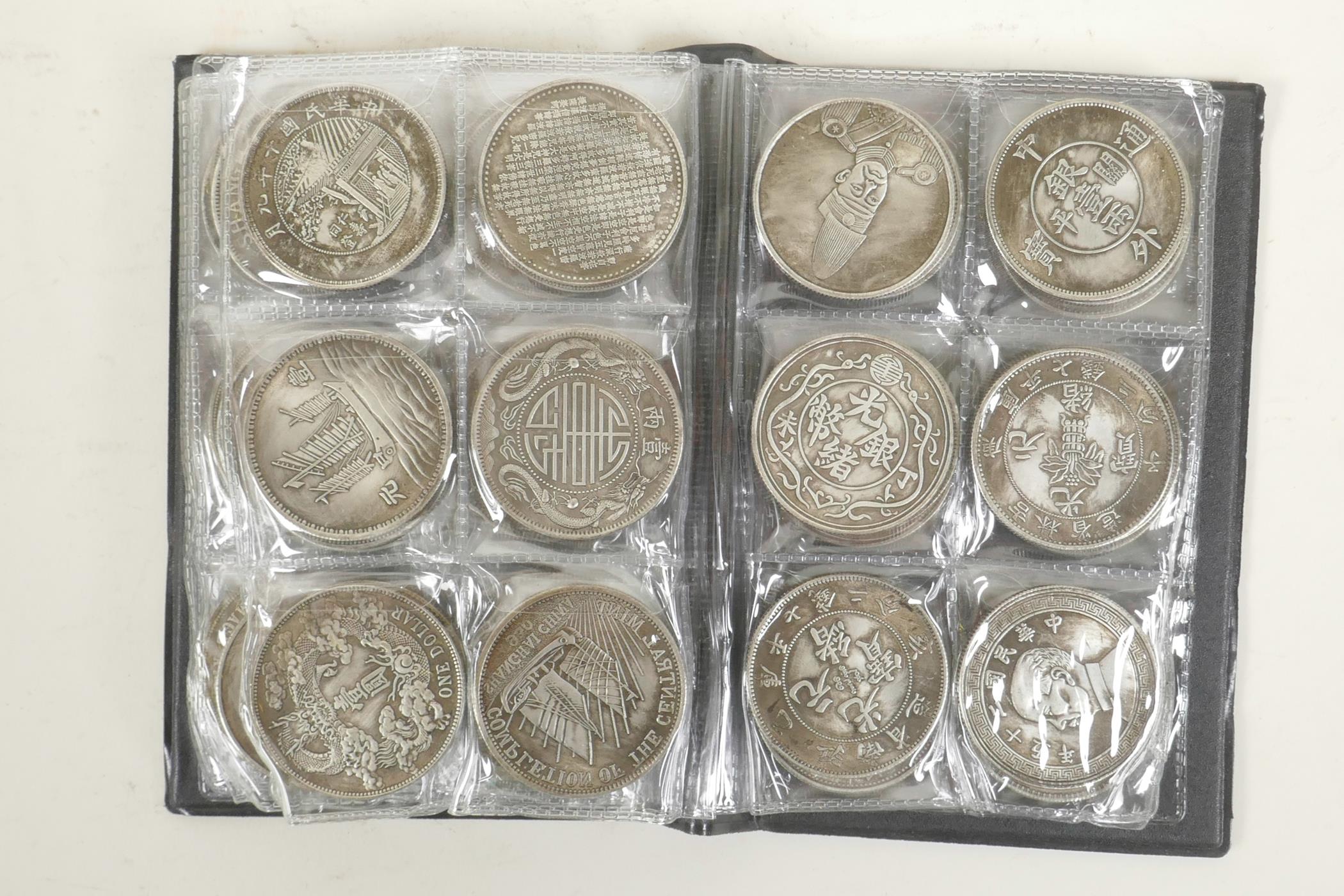 A wallet of sixty facsimile (replica) Chinese coins/medallions, 1½" diameter - Image 5 of 5