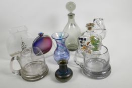 A collection of studio glass including a Holmegaard dimple decanter, a Pasabahce vase with silver