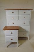 A pine topped white painted wood chest of drawers, four short over three long, and a matching two