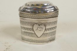 A late C18th/early C19th Continental silver pill box of caddy shape with banded, engraved decoration