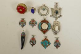 A quantity of Indian white metal stone and composition set jewellery to include pendants and rings