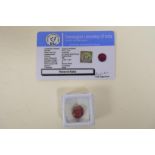 A 10.75ct natural ruby, oval cut, colour enhanced, certified by Gemological Laboratory of India,