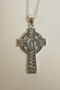 A 925 silver pendant in the form of a Celtic cross, with green stone settings, 2" drop