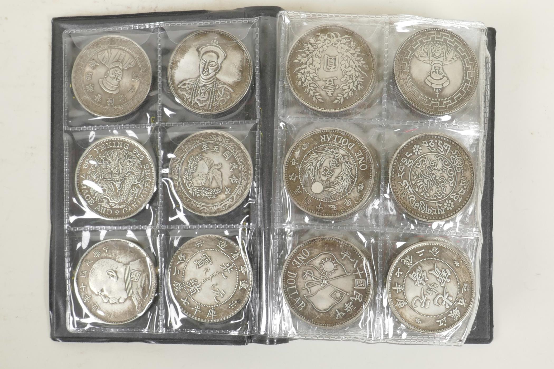 A wallet of sixty facsimile (replica) Chinese coins/medallions, 1½" diameter - Image 3 of 5