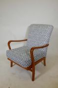 A mid century retro beechwood open armchair, 34" high