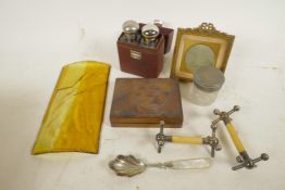 A quantity of miscellaneous items including a leather travel case with two glass and silver plated