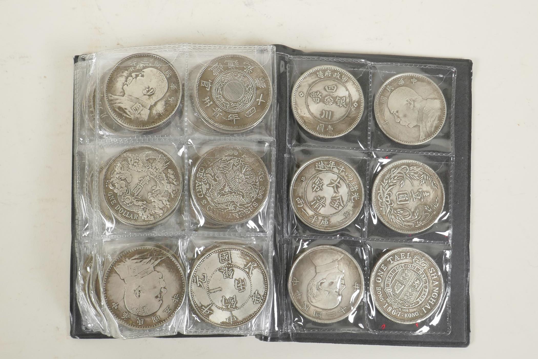 A wallet of sixty facsimile (replica) Chinese coins/medallions, 1½" diameter - Image 4 of 5