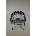 An Indian wrought metal garden tub chair with peacock feather/balloon decoration, 35" high