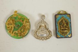 A Chinese white metal Buddha pendant, together with a jade pi disc set with a gilt metal dragon