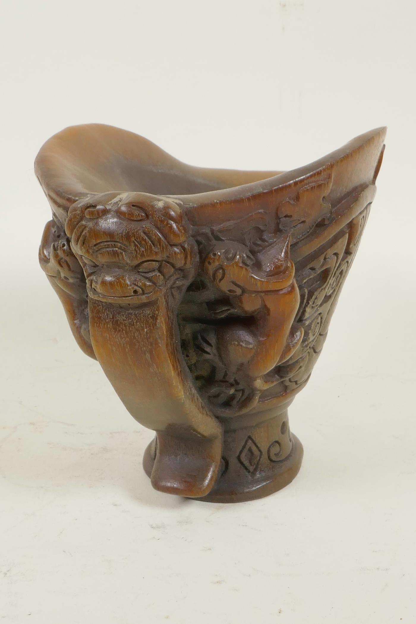 A Chinese faux horn libation cup decorated with archaic symbols and exotic beasts, 5" high - Image 4 of 4