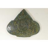 An Islamic spinach jade pendant with engraved and gilt character inscription, 3" x 2½"