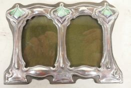 An Art Nouveau style sterling silver and enamel double photograph frame, 4½" x 3", apertures 1½" x