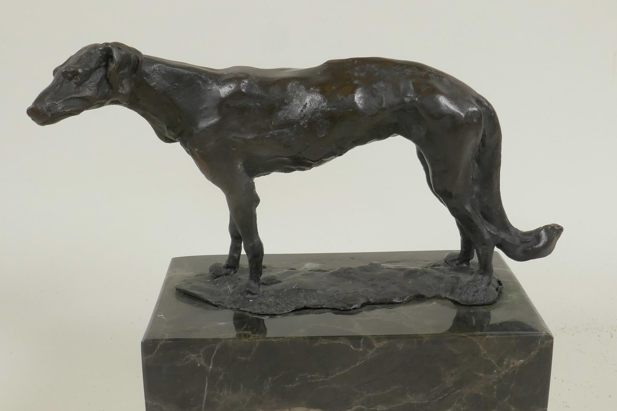 A bronze figure of a Borzoi hound mounted on a marble plinth, 6¼" long - Image 2 of 2