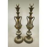 A pair of classical style gilt metal lamp bases in the form of floral decorated urns, 28" high