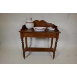 A Victorian satin walnut washstand with jug, bowl and toothbrush dish, 34" x 18", 37" high