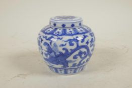 A Chinese blue and white porcelain ginger jar and cover decorated with mythical creatures, mark to