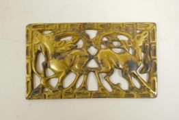 An Ordos bronze plaque with pierced goat decoration and a gilt patina, 5" x 3"