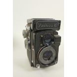 A Yashica-E twin lens reflex camera, 6" high