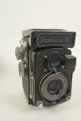 A Yashica-E twin lens reflex camera, 6" high