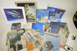 A collection of NASA space exploration ephemera to include a 'Columbia Pictures 8mm home movie-Apoll