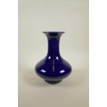 A Chinese powder blue glaze porcelain vase of squat form, 10" high