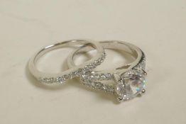 Two silver and cubic zirconium rings with encrusted shoulders, approximate size 'O/P'