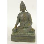 A Sino-Tibetan bronze figure of Buddha seated in meditation, 9½" high